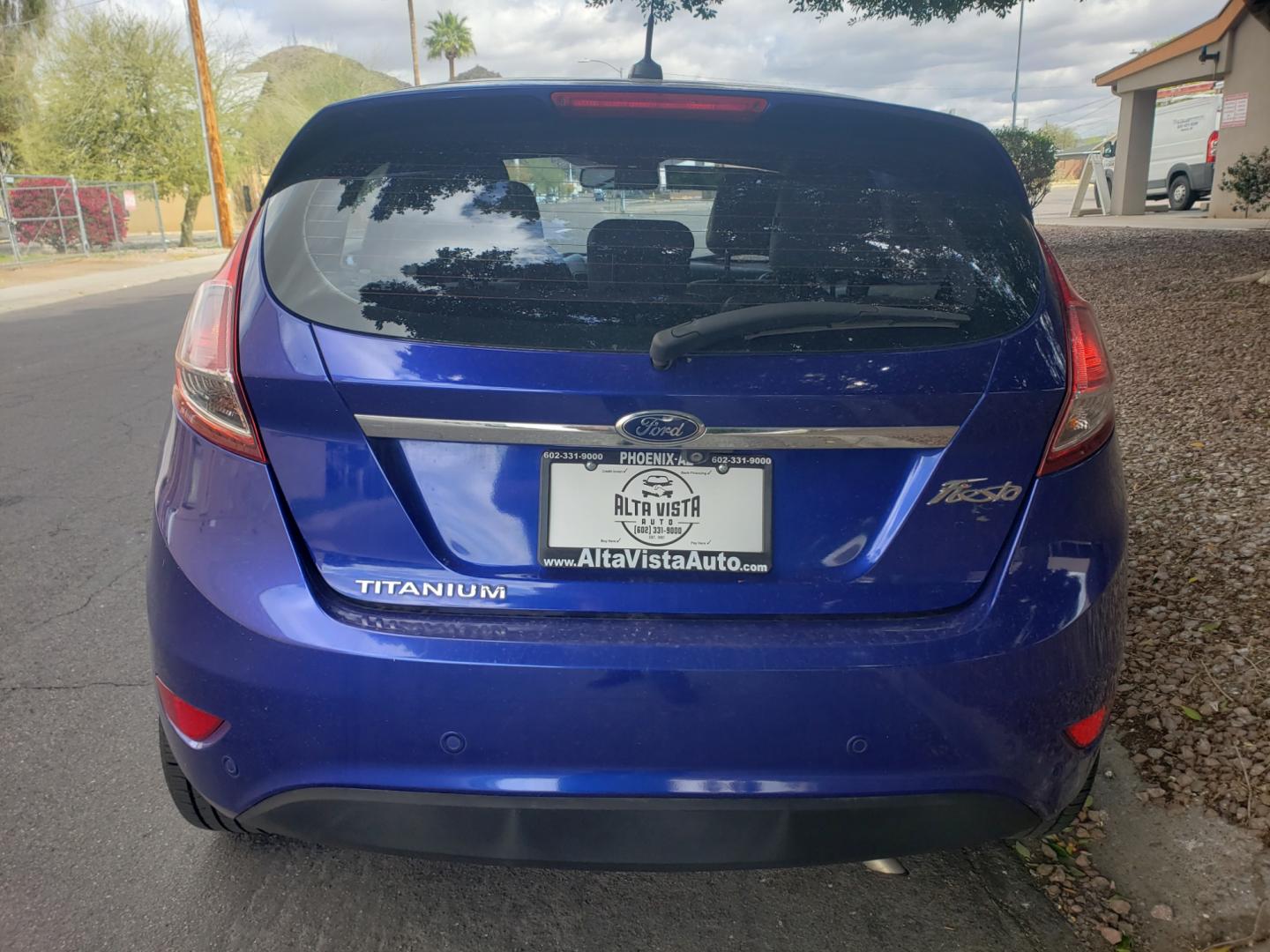 2014 /Tan and black Ford Fiesta Titanium (3FADP4FJ5EM) with an 1.6l i4 engine, 6-Speed Automatic transmission, located at 323 E Dunlap Ave., Phoenix, AZ, 85020, (602) 331-9000, 33.567677, -112.069000 - 2014 Ford Fiesta Titanium,.......A Must See!!... No accidents, Only 95K MILES.... Ice cold AC. The car is gorgeous inside and out. Power windows, Power door locks, Touch screen Stereo/ CD Player, Phone sync, Bluetooth, Satellite compatible, Backup camera, Beautiful tan and black interior with tan le - Photo#7